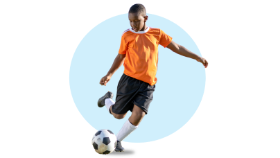 boy playing soccer